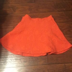 Orange brocade fit and flare skirt